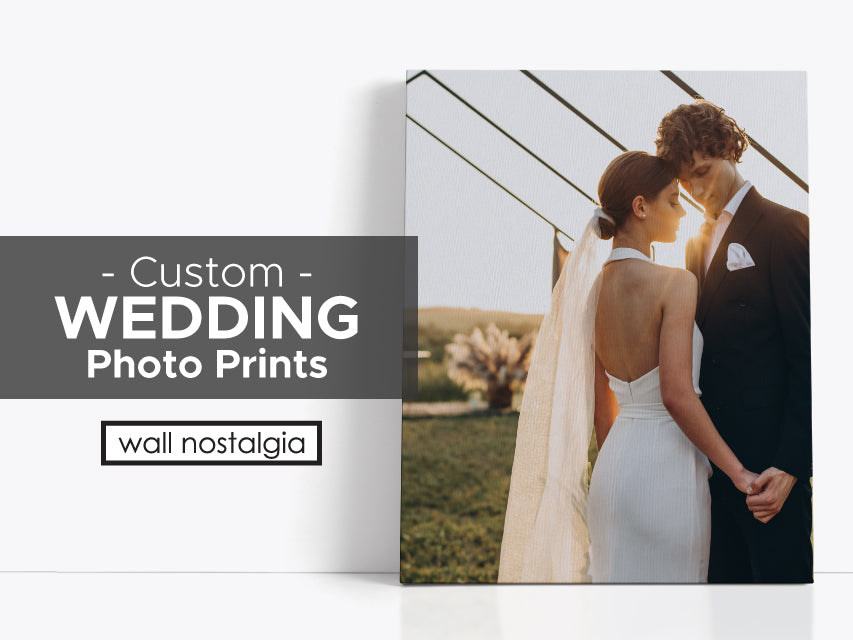 Blog post cover image that shows two printed canvas as wall decor and shows a Bride and Groom on their wedding day. Text says "Custom Wedding Photo Printing" by Wall Nostalgia. They specialize in personalized prints and canvas for wall decor and art.