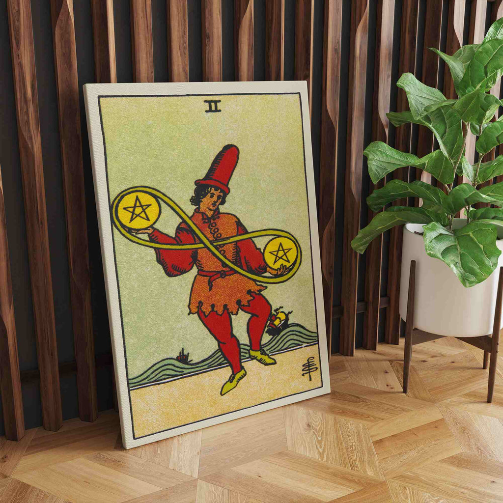 Two of Pentacles Tarot Card Canvas Print | Canvas wall art prints by Wall Nostalgia. Custom canvas prints made in Calgary, canvas wall art canada, tarot cards printing Canada, tarot card art prints, two of pentacles tarot card canvas art, tarot card art, tarot cards canada, tarot card pictures, canvas prints Canada